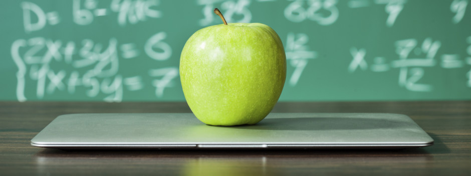 Laptop and apple on the desk