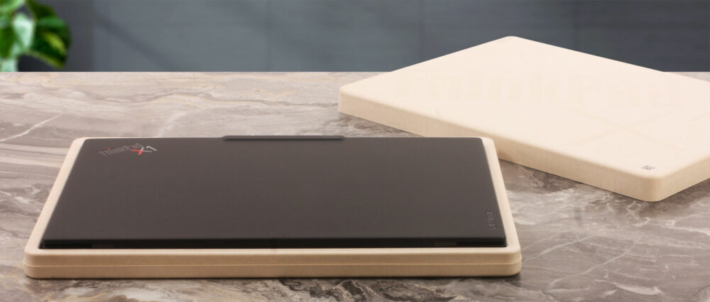Lenovo ThinkPad X1 Carbon Gen 14 Aura Edition inside its molded-fiber packaging